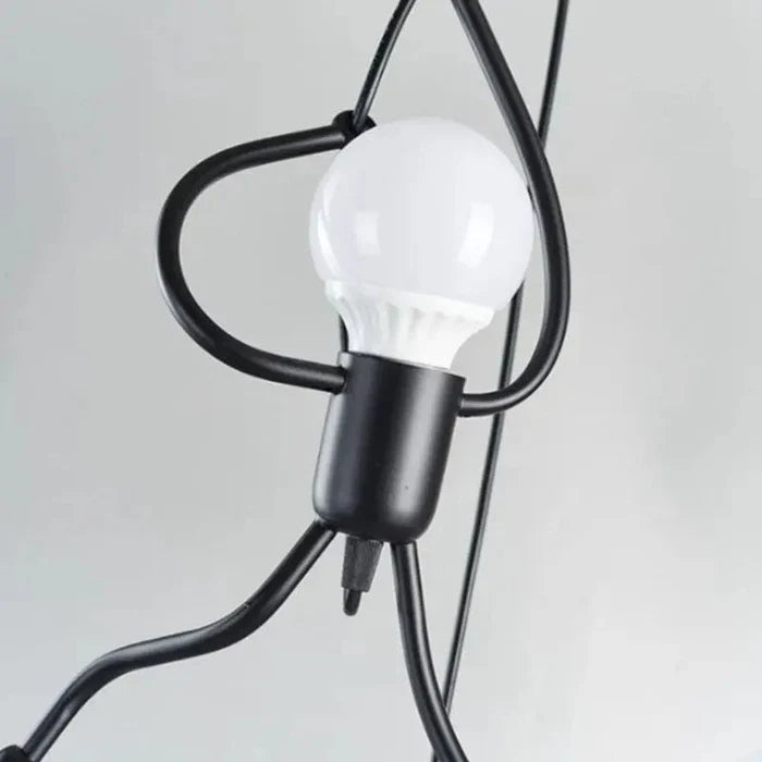 Pendellampe med klatrende figur