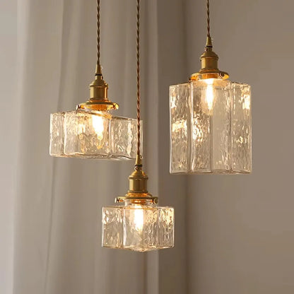 Vintage pendellampe i glas med messingfinish