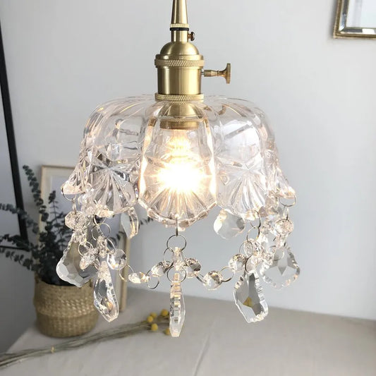 Retro pendellampe i krystalklart glas med messingfinish