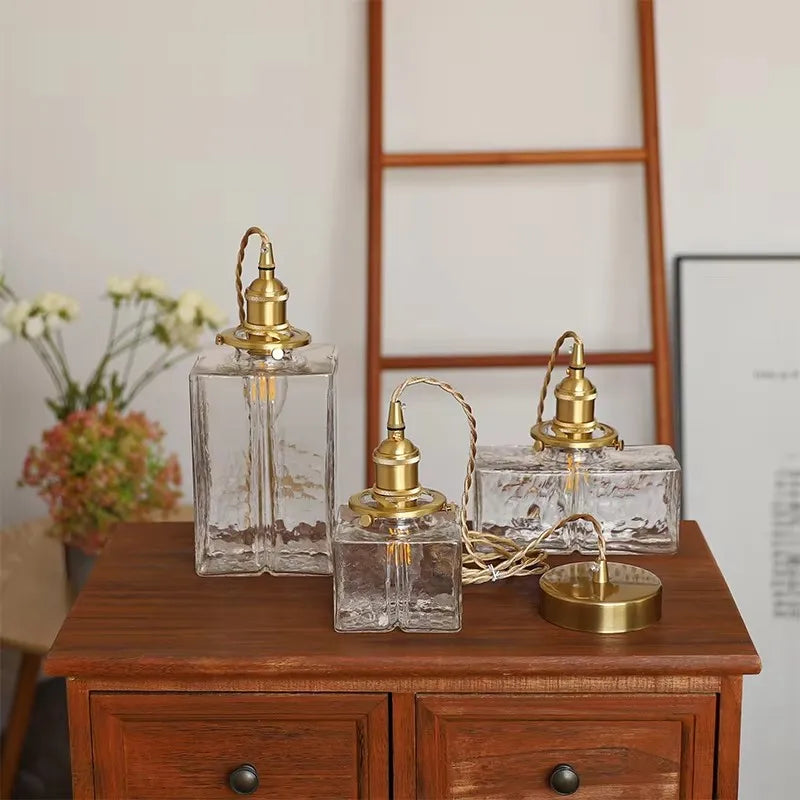 Vintage pendellampe i glas med messingfinish