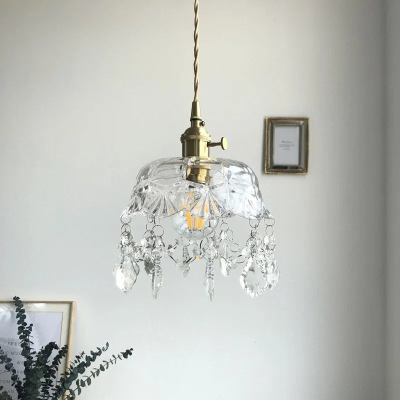 Retro pendellampe i krystalklart glas med messingfinish