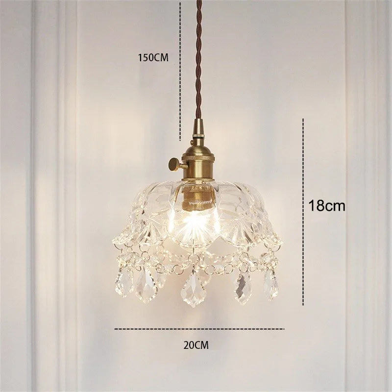 Retro pendellampe i krystalklart glas med messingfinish