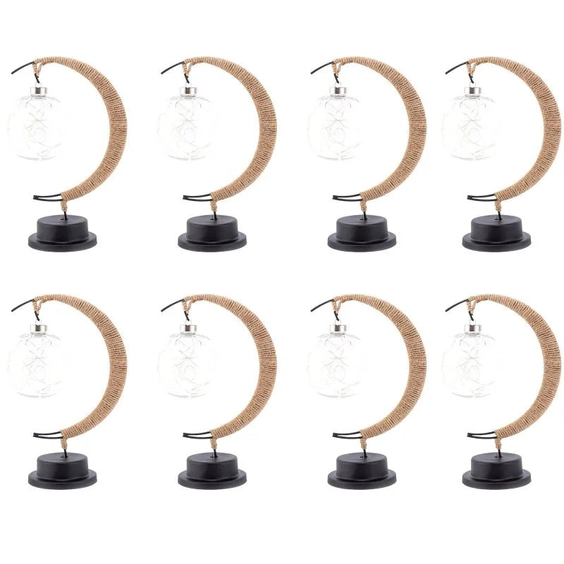 Stemningsfuld LED-bordlampe med glaskugle og halvmåne