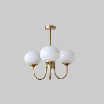 Lysekrone i retro glamour-stil med kugleformede skærme