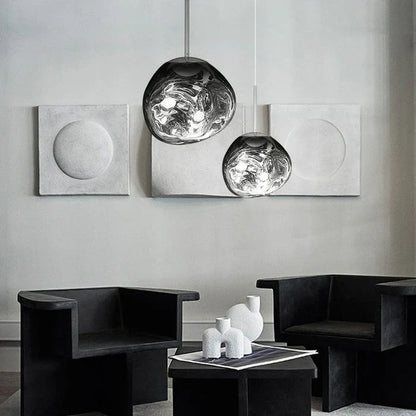Designerpendellampe med smeltet kugle-design