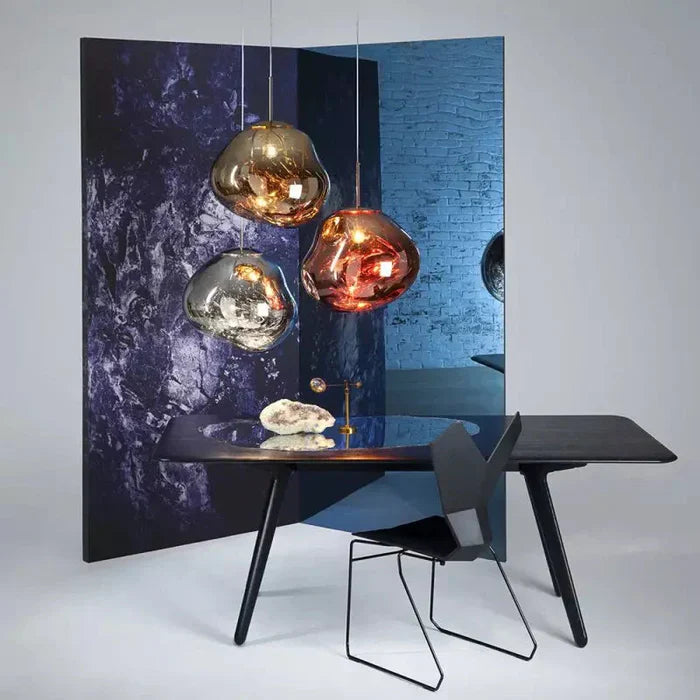 Designerpendellampe med smeltet kugle-design