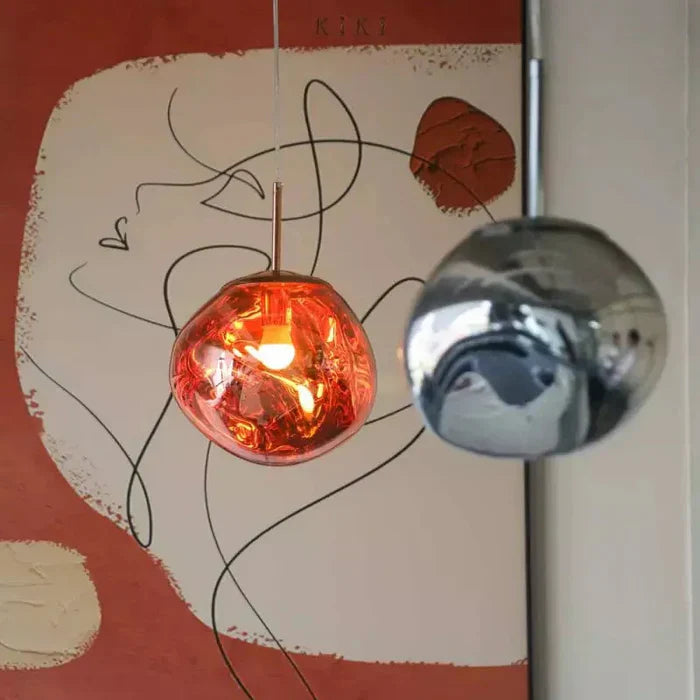 Designerpendellampe med smeltet kugle-design