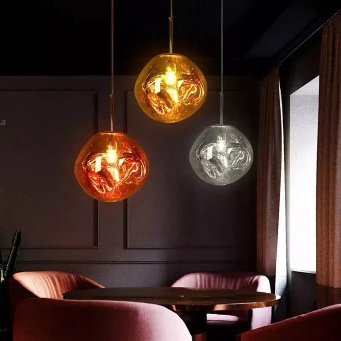 Designerpendellampe med smeltet kugle-design