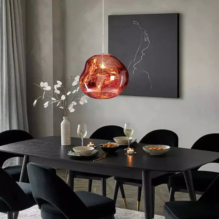 Designerpendellampe med smeltet kugle-design