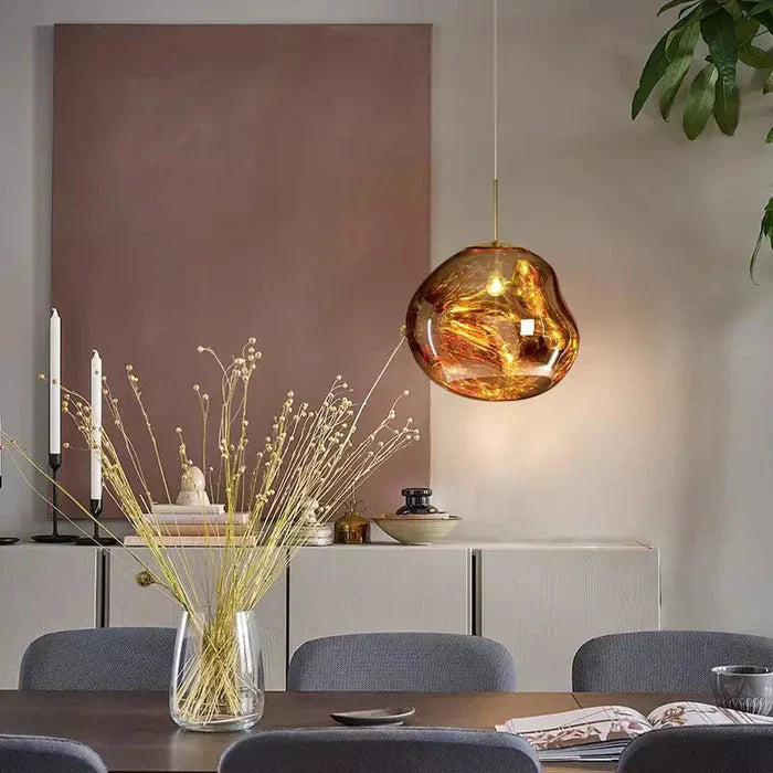 Designerpendellampe med smeltet kugle-design