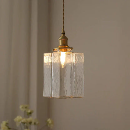 Vintage pendellampe i glas med messingfinish