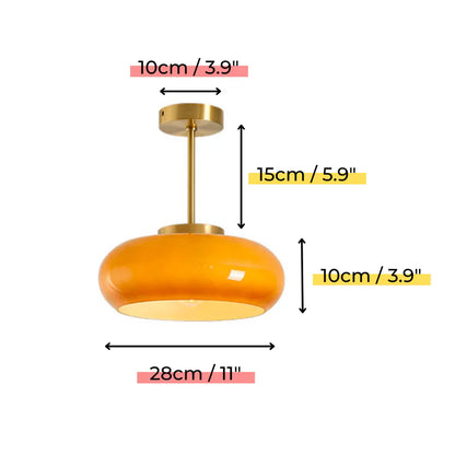 Elegant loftlampe med orange glasskærm i vintage stil