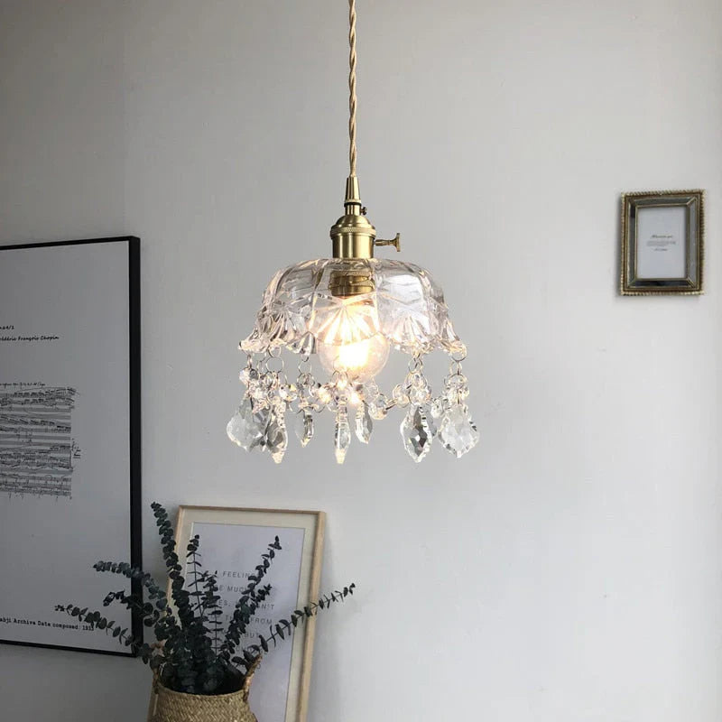 Retro pendellampe i krystalklart glas med messingfinish
