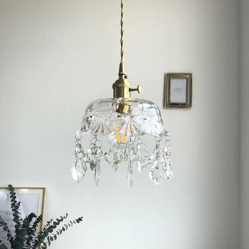 Retro pendellampe i krystalklart glas med messingfinish