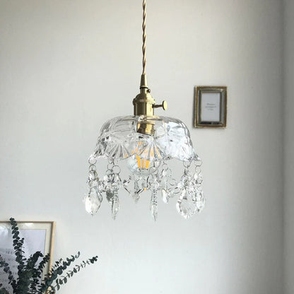 Retro pendellampe i krystalklart glas med messingfinish