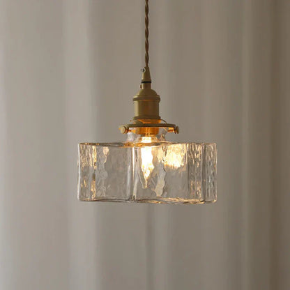 Vintage pendellampe i glas med messingfinish