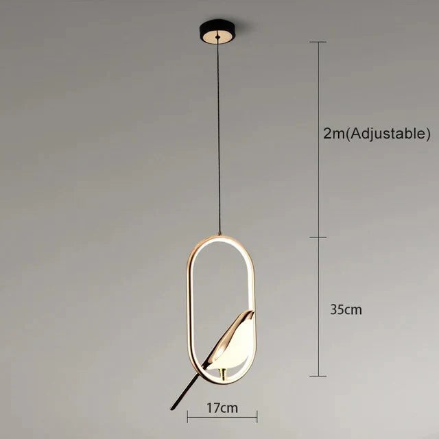 Pendellampe med gyldent fuglomotiv
