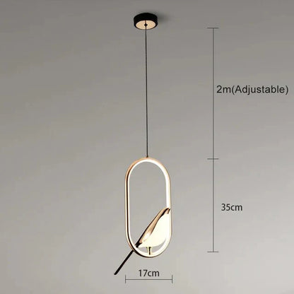 Pendellampe med gyldent fuglomotiv